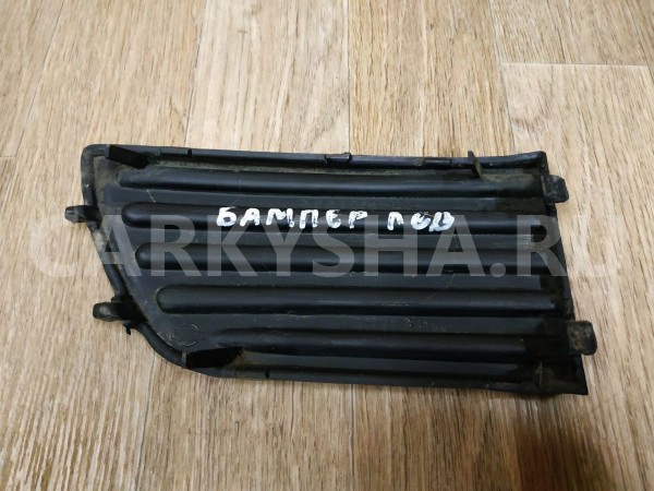 Заглушка бампера левая Nissan Primera 
