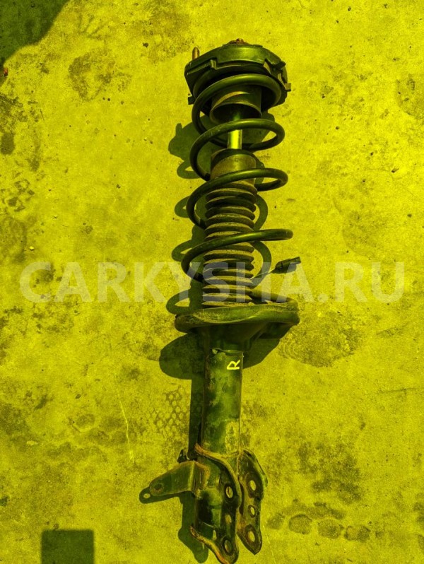 Стойка Mazda Familia 