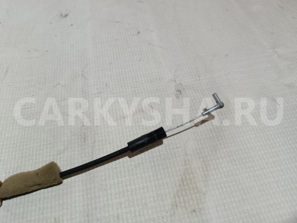 Трос замка двери Mitsubishi Lancer оригинальный номер MN159618
