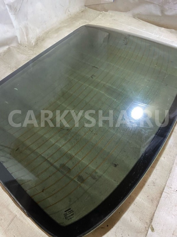 Стекло заднее кузовное Nissan Primera 