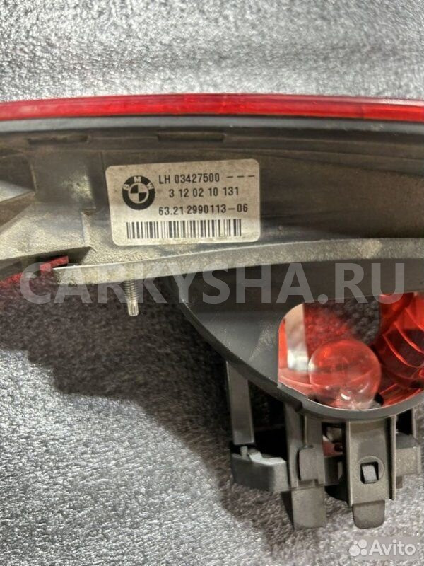 Фонарь в крышку багажника задний BMW X1 E84 N46B20 BMW X1 оригинальный номер 63 21 2 990 113