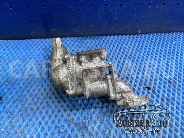 Корпус термостата Mitsubishi Pajero 4 Montero, Mitsubishi i оригинальный номер 1305A418