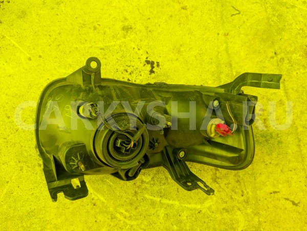 Фара Mazda Tribute 