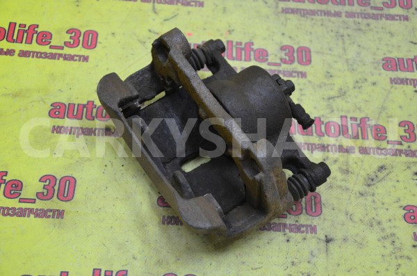 Суппорт тормозной передний правый Nissan Qashqai 