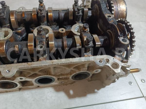 Головка блока (в сборе) Toyota Yaris оригинальный номер 111010D030
