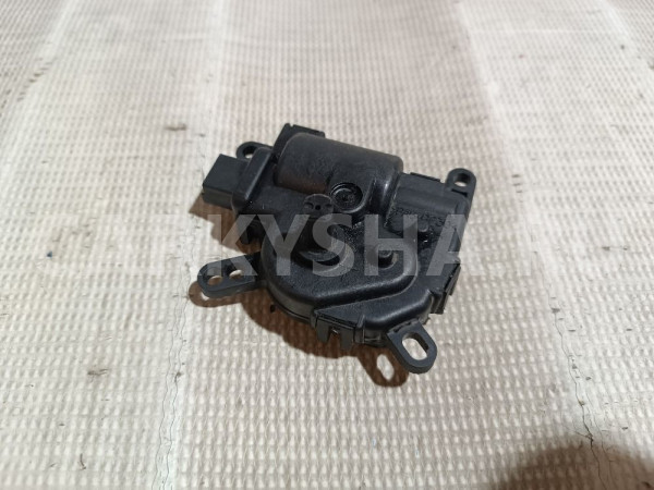 Моторчик заслонки отопителя Ford Mondeo оригинальный номер 1S7H19B634CA