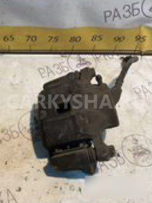 Суппорт левый Mitsubishi Chariot Mitsubishi i оригинальный номер MB699706