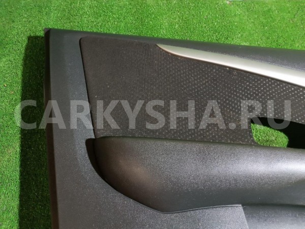 Обшивка двери передней левой Nissan Almera 