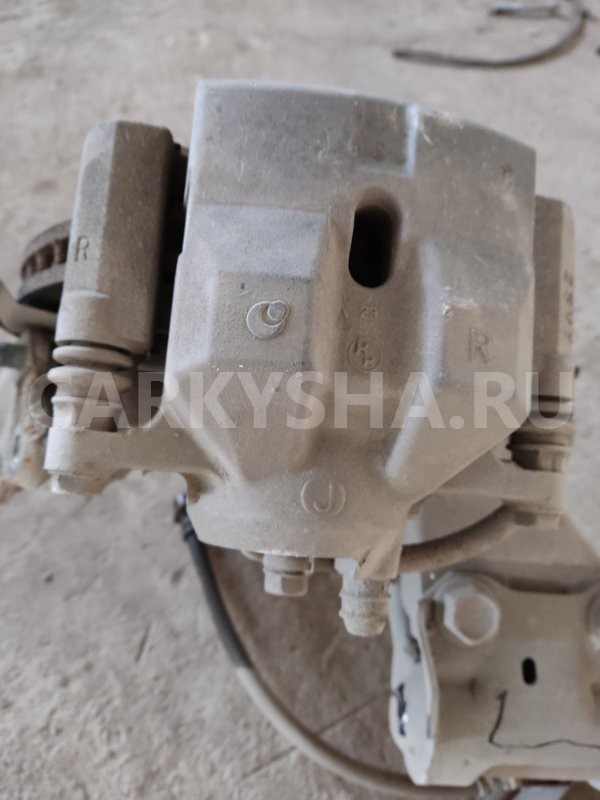 Суппорт тормозной Toyota Prius 