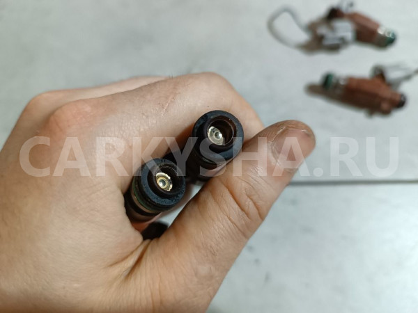 Форсунки топливные к-кт Nissan Sunny оригинальный номер 166005L300