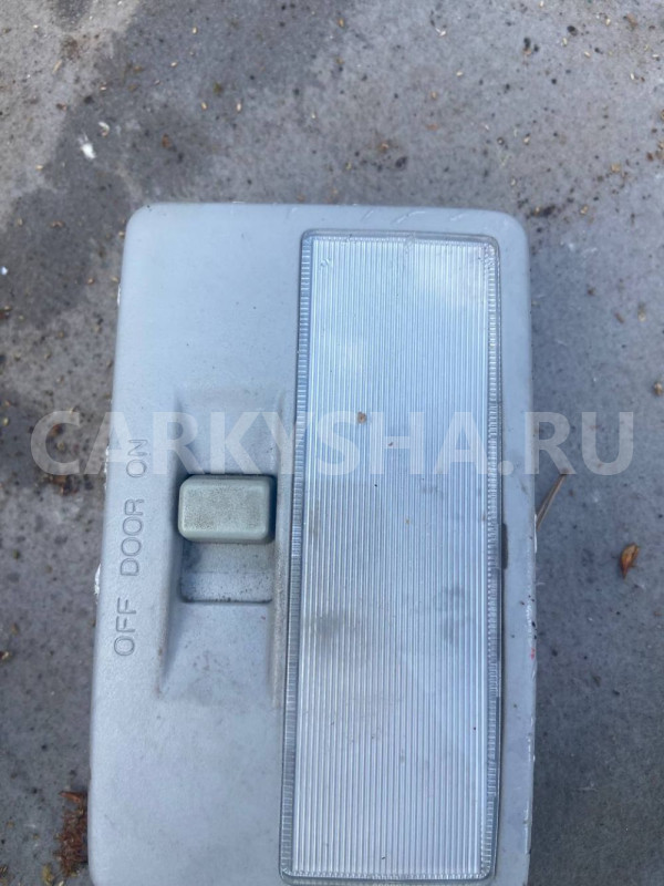Плафон салонный Mazda Demio IDY (2002—2007) Mazda 2 оригинальный номер 997005100L