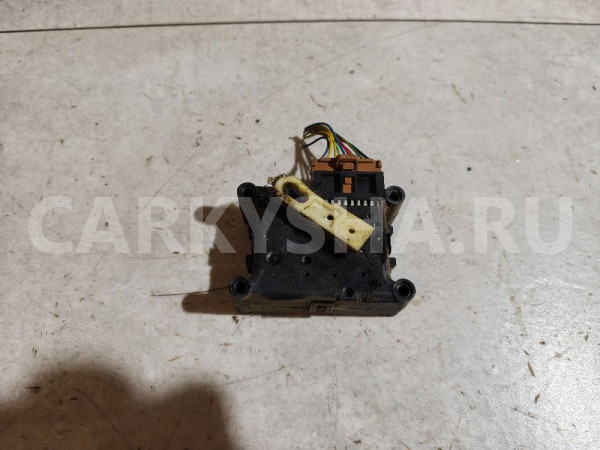 Моторчик заслонки отопителя Subaru Legacy оригинальный номер 72143AC010