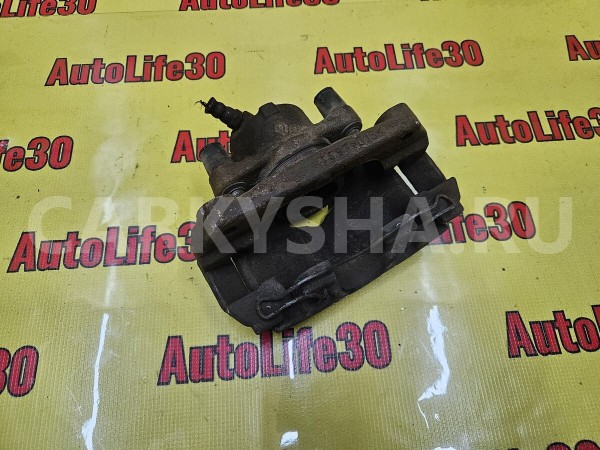 Суппорт тормозной передний левый Renault Duster 
