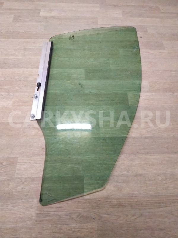 Стекло двери передней правой Opel Astra 