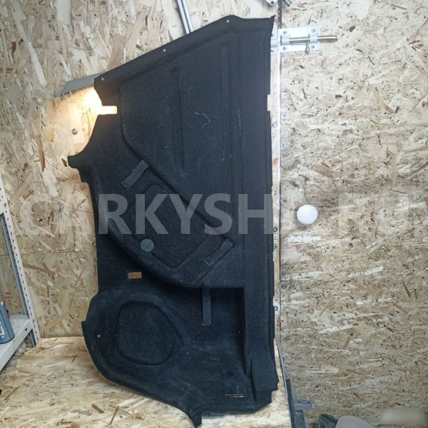 Обшивка багажника левая Opel Astra J Opel Astra оригинальный номер 13365510
