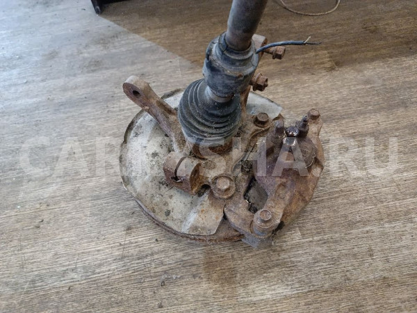 Кулак поворотный передний левый Mitsubishi Lancer оригинальный номер 3870A011