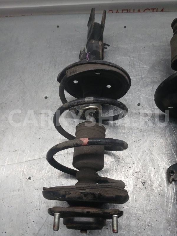 Стойка подвески Mitsubishi Colt 